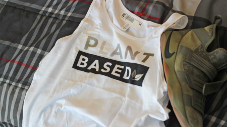 Plant-Based-Tank-On-Bed-2 Plant Based Army Unisex Tank Top
