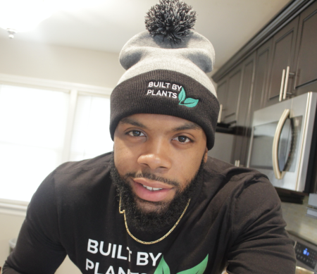 Najee Kelley wearing Built By Plants hat