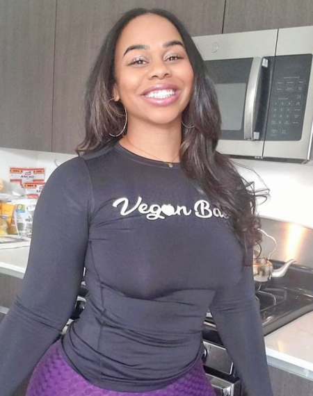 Reina wearing Vegan Bae Tank Top